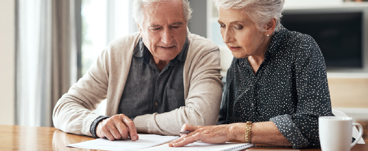 elderly couple thinking about estate planning