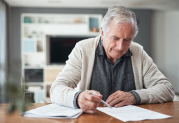 Older man working on estate plan